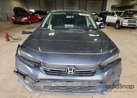 2022 Honda Civic Touring z USA, uszkodzony, nr VIN 2HGFE1F96NH001021